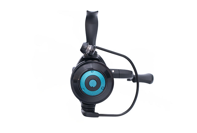 Drennan Vertex 4000 feeder reel from behind, showing the teal rear drag dial set into the body