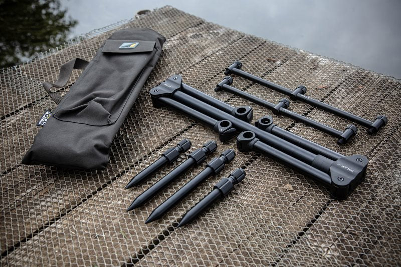 Solar A1 Aluminium Ground Pod broken down, showing the zipped carry bag, two pairs of uprights, two 3-rod buzz bars and the main bar