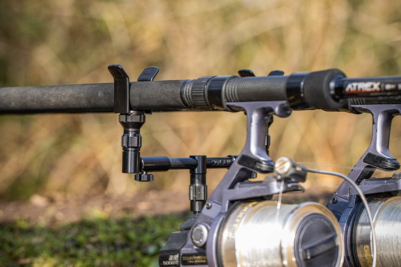 Solar Black-Lite Centre-Loc back rest fitted to a buzz bar behind two rods and reels