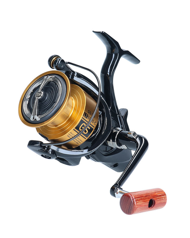 Daiwa 20 GS BR LT 5000-C reel, angled view of the gold spool and wooden handle knob