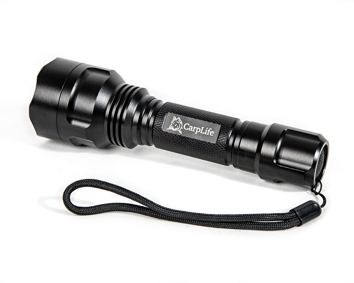 CarpLife Compact Bird Torch on white, three-quarter view showing the fluted alloy head, knurled grip and tail switch