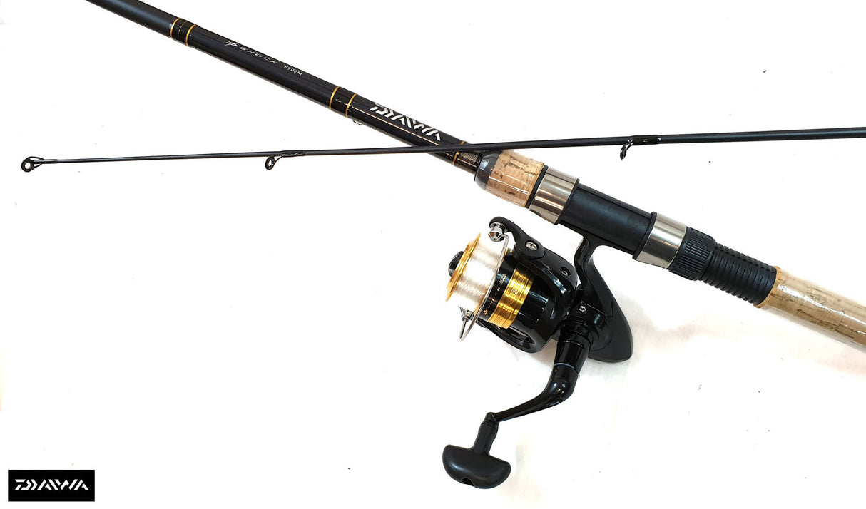 Daiwa D Shock 7ft spinning combo, the made-up rod and 3000 size reel from the reel-seat side, blank marked D-SHOCK F702M