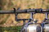 Solar Black-Lite Centre-Loc back rest fitted to a buzz bar behind two rods and reels