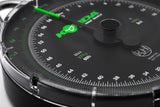 Angled close-up of the 60lb dial face, showing the green kilogram track, the white pound track and the Max 27Kg 60lb legend