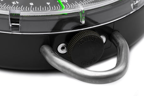 Close-up of the knurled ADJUST / ZERO knob on the scale body next to the stainless steel bottom hanging loop