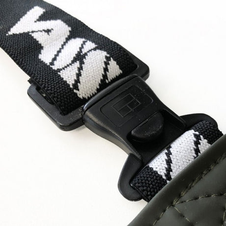 Vass-Tex 650 chest wader black and white elasticated VASS brace and quick-release buckle close-up