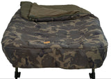 End-on view from the foot of the bed with the bag turned back, showing the Worldwide camo peach skin mattress outer, the gold oval badge and the leg tops.
