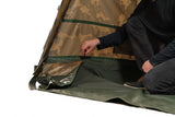 The heavy-duty groundsheet being zipped into the base of the Solar Worldwide Spider FS bivvy