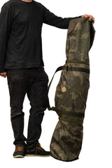 The camo carry bag supplied with the Solar Worldwide Spider FS bivvy, held for scale